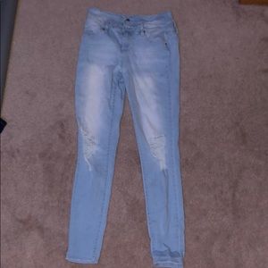 Ripped light blue jeans
